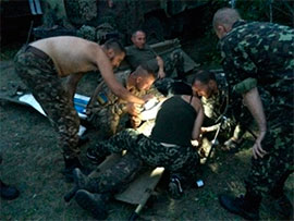 Десантники миколаївської бригади, прорвавши оточення бойовиків, вивели важкопоранених та резервістів