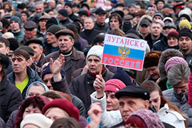 Споглядаючи з місця подій: як рік тому Київ здавав Луганськ
